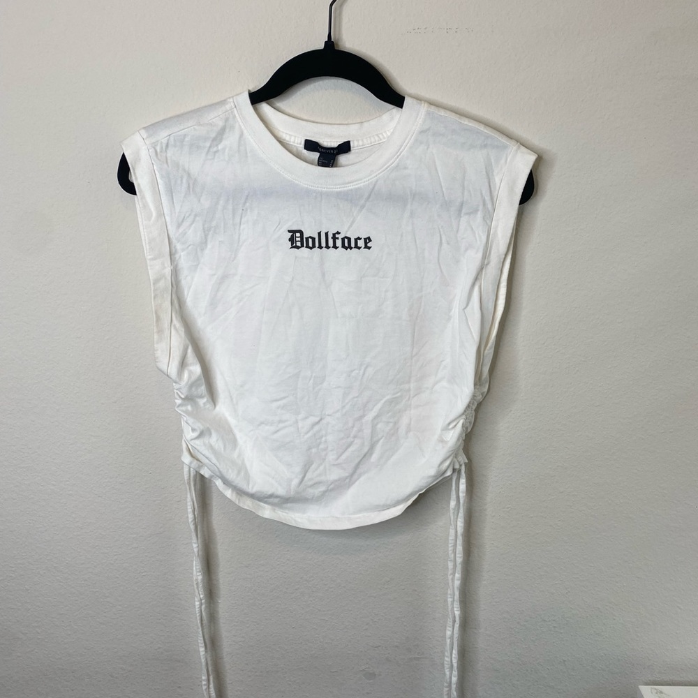Forever 21 white “doll face” shirt